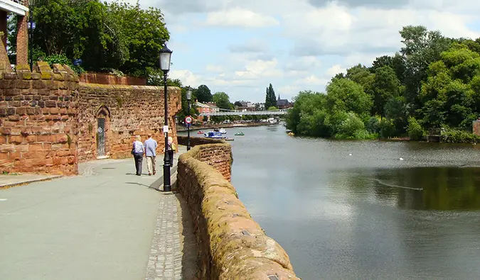pedestrians walking along the city walls in Chester England; Photo by Sheri (Flickr: @bellatrix6)