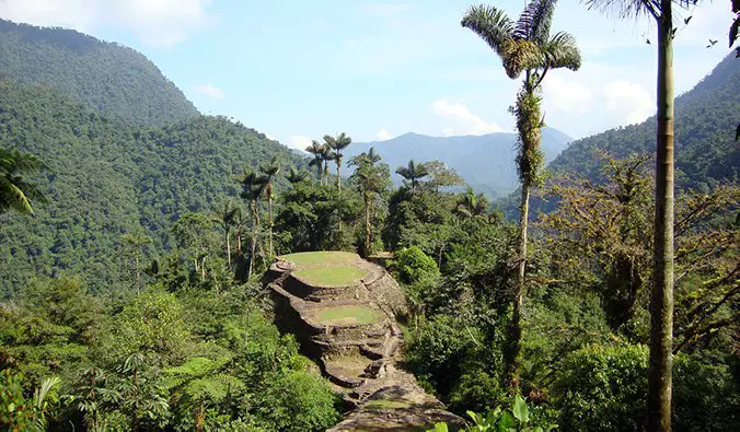 the La Ciudad Perdida trek in Colombia with terraces and stone steps; photo by Liam King (flickr:@liam-hels-big-trip)