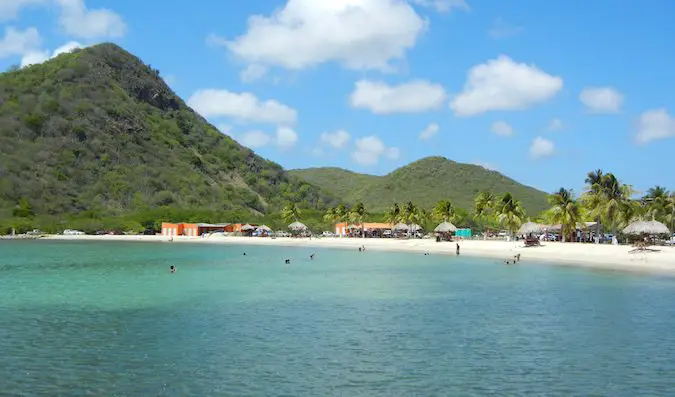 Beautiful Caribbean beaches with rolling hills behind them