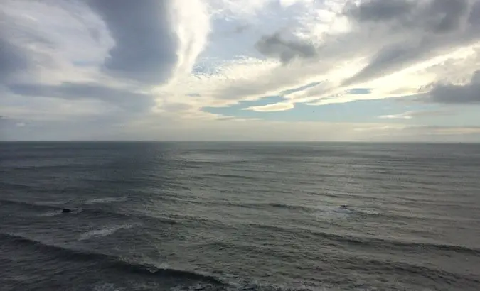 Beautiful clouds above the harsh sea on the eastern end of Iceland