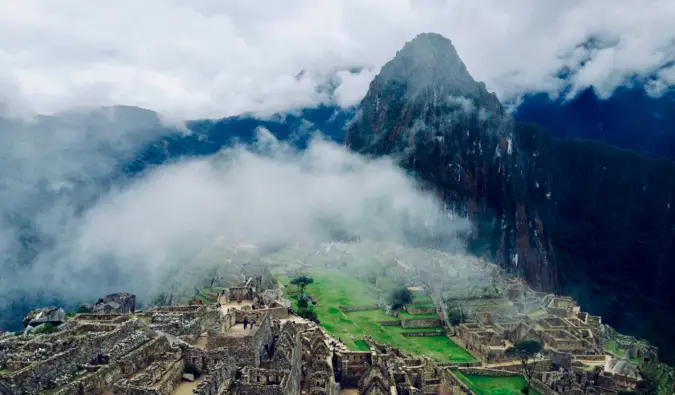 the sweeping vista of Machu Picchu in the fog