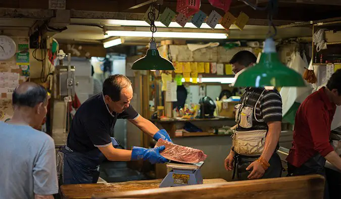 busy merchants at the Tokyo fish market