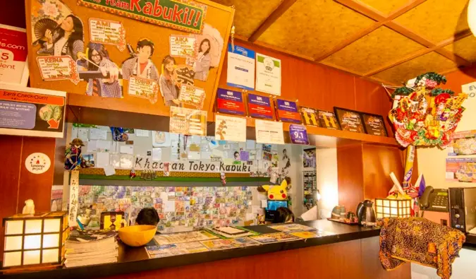 The electic and colorful check-in desk at Khaosan Tokyo Kabuki hostel in Tokyo, Japan